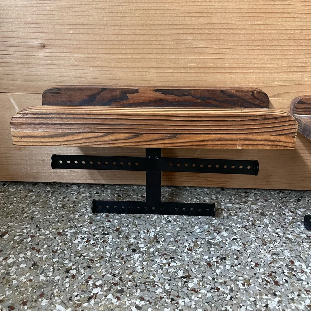 Wooden shelves with jewelry holders.
